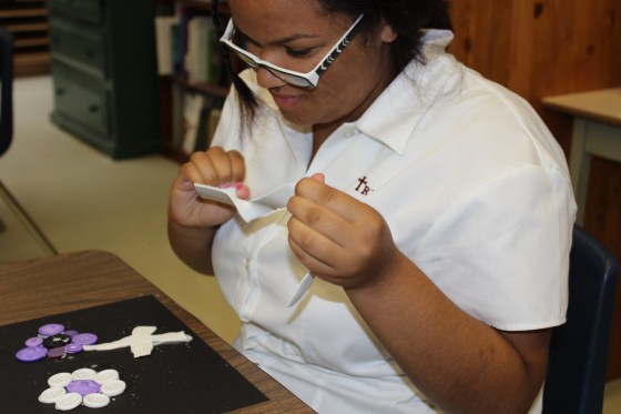 Atessa Crawford adds the finishing touches to her masterpeice