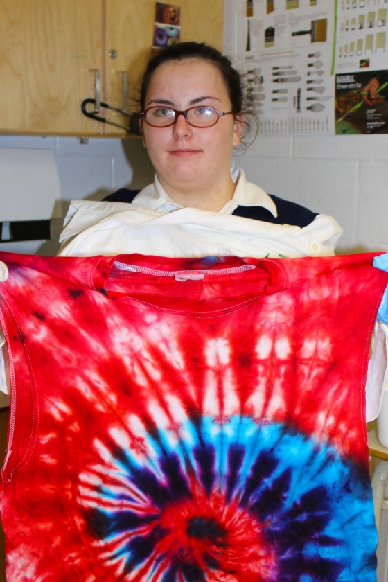 Emily Wood-Quinn proudly shows off her tie died shirt