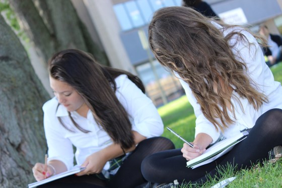 ??? and ??? working hard at their sketches